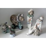 NAO clown and circus figures, a bear on a bicycle and a Lladro seal balancing a ball (5) all without