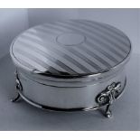 A Victorian silver circular trinket box with engine turned decoration to hinged lid, lined and