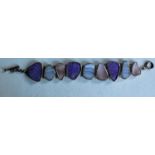 A silver .925 boxed bracelet with irregular shaped silver mounted coloured agates