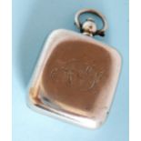 An Edwardian silver and gilded, square single sovereign case, monogrammed, by John Gilbert,