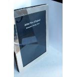 An Arthur Price silver photo frame, 21.5 x 16.5 cm, on easel stand, London 1999, as new