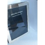 An Arthur Price silver photo frame, 21.5 x 16.5 cm, on easel stand, London 1999, as new