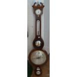 An Georgian mahogany banjo barometer by Bruce & Mc