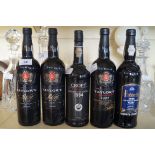 Five various bottles of port, to include Tay