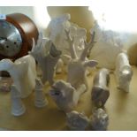 Fourteen pieces of white glazed ceramics to includ