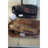 Two vintage baseball gloves, one example made Rawl