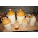 Seven assorted stoneware flagons including " A Bar