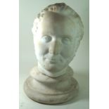 A carved marble bust of head of a gentleman Mounted on a matching socle base, height approx 41cm.