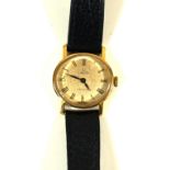 An Omega De Ville ladies wristwatch Mounted on a black leather strap,