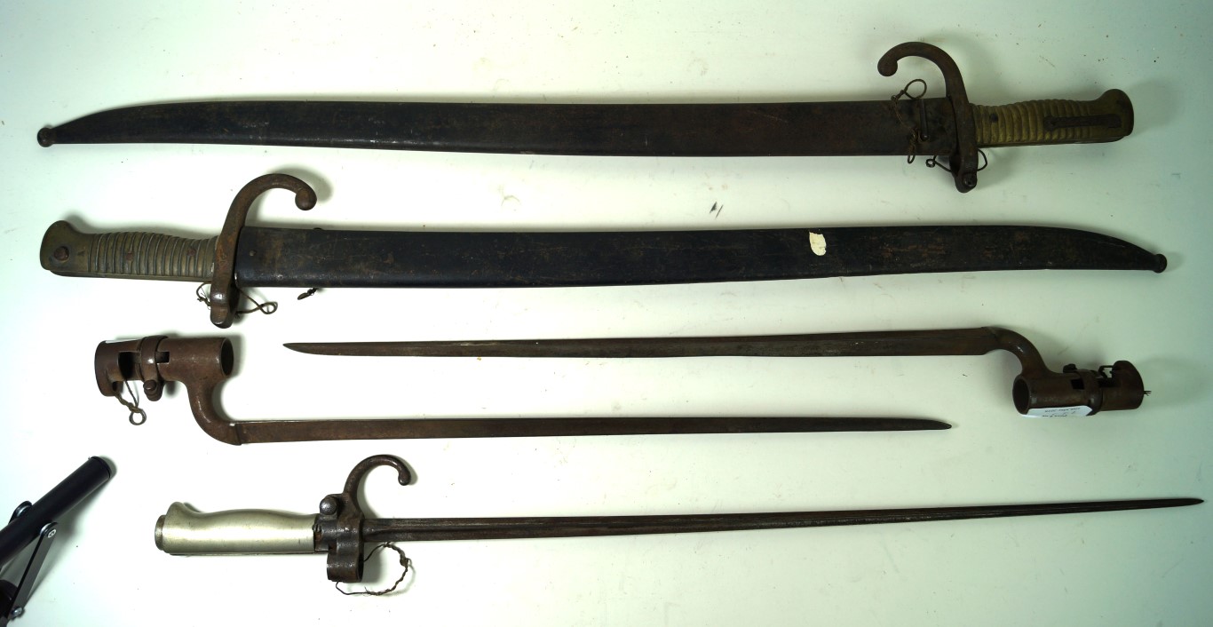 A French chassepot bayonet, dated 1874 57cm yataghan blade, complete with metal scabbard,