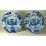 18th century Delft tin glaze pair of circular chargers Each decorated in the oriental manner,