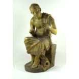 Goldscheider figure depicting a pot thrower Finished in a green glaze,