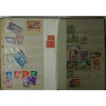 A small collection of both mint and used postage stamps Comprising two albums containing Hungarian