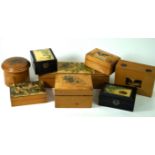 A collection of twelve Mauchline ware boxes late 19th Century The lids decorated with scenes from