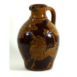 20th century, Sheen art pottery slip-ware jug Of ovoid form,