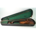 An Antonio Stradivarius copy violin mid / late 19th Century 35cm back,