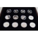 Cased silver proof Solomon Island commemorative set Comprising twelve silver proof coins