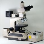 An Olympus BH2-UMA electronic research microscope, also a Olympus TGH lightbox.