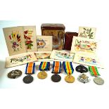 A collection of WWI medals Comprising pair awarded to 131561 driver F Beard of the Royal Artillery