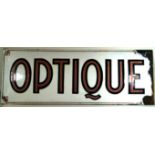 A French optique enamel sign early 20th Century 40x110cm.