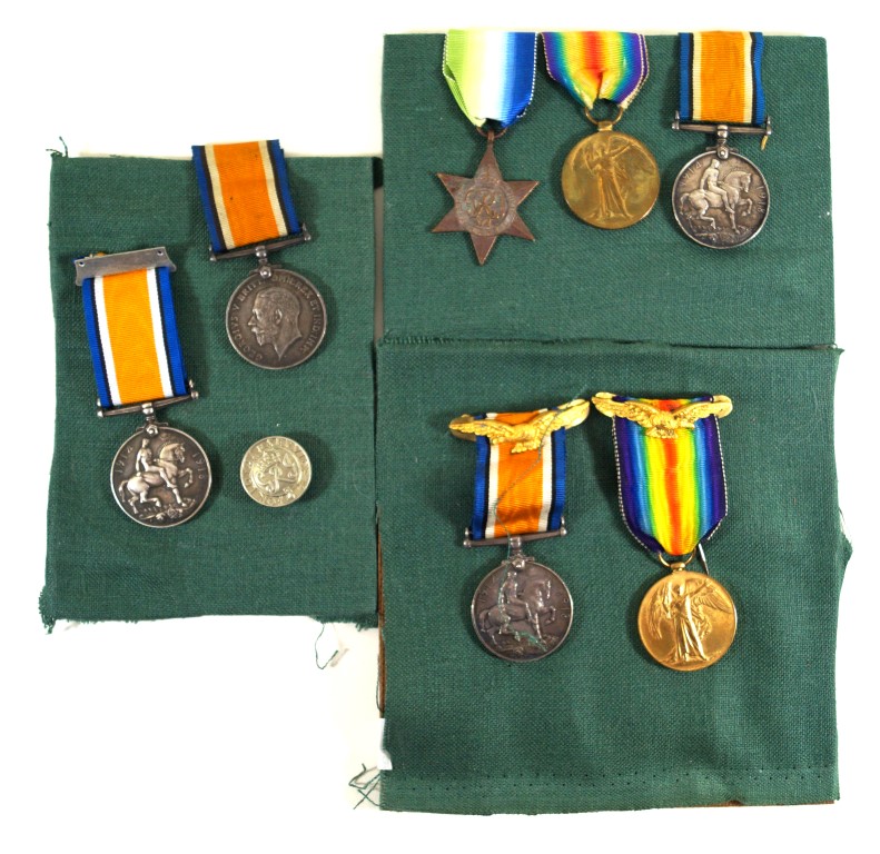 A collection of WWI medals Framed two British War medals awarded to 212718 S W Spedding of the RAF,