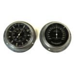 A Negretti & Zambra of London auto altimeter 20th Century The chrome mounted gauge with black face