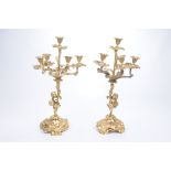 A fine pair of 19th Century Louis XVI style French gilt bronze candelabra The five branch