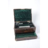 A 19th Century Rosewood ladies travelling case The brass bound box with polished brass edging,