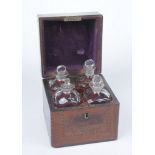 A 19th Century mahogany travelling liquor decanter box The square section box,