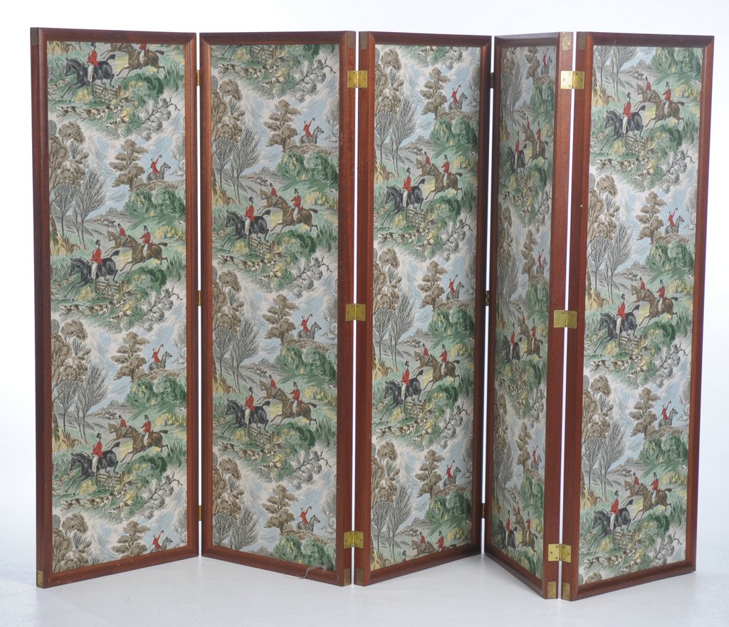 A mahogany framed five fold room screen The frame with brass embellishments and each panel covered