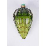An early 20th Century glass toiletry or perfume bottle,