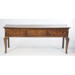 A George III oak dresser base The two plank rectangular top above three short drawers fitted with