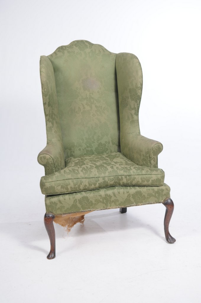 A Queen Anne and later wing back fireside armchair,