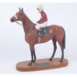 A Beswick Connoisseur figure "Red Rum, Brian Fletcher up" The bisque horse and rider,