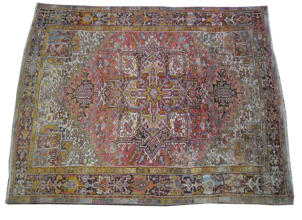 A Persian medallion rug The large rectangular rug on a predominantly pink ground,