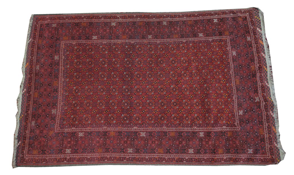 An Ushak style rug On a predominantly ruby red ground,