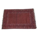 An Ushak style rug On a predominantly ruby red ground,