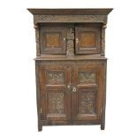 A 19th Century Flemish style buffet or Court Cupboard The cavetto cornice above a frieze carved