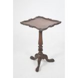 A 19th Century Gillows style oak pedestal table, the square shaped top with a scroll moulded border,