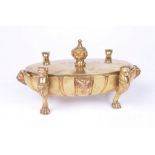 A Victorian gilt metal desk stand The oval and fluted stand,