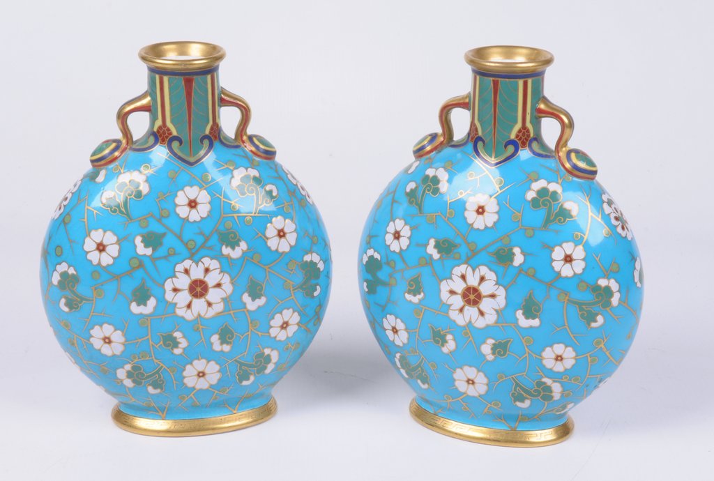 A pair of English porcelain Moonflasks, possibly Minton, Circa 1880 Each of flattened circular form,