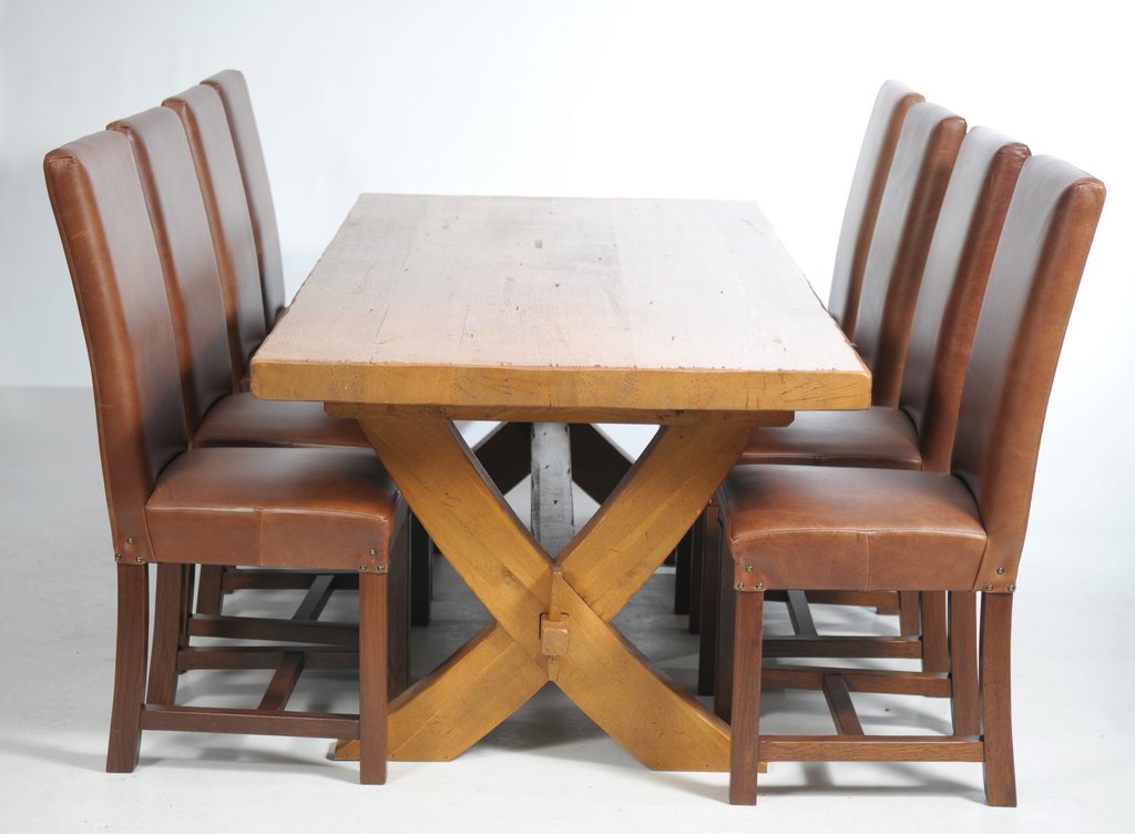 A Contemporary golden oak refectory table and a set of eight conforming high back dining chairs The