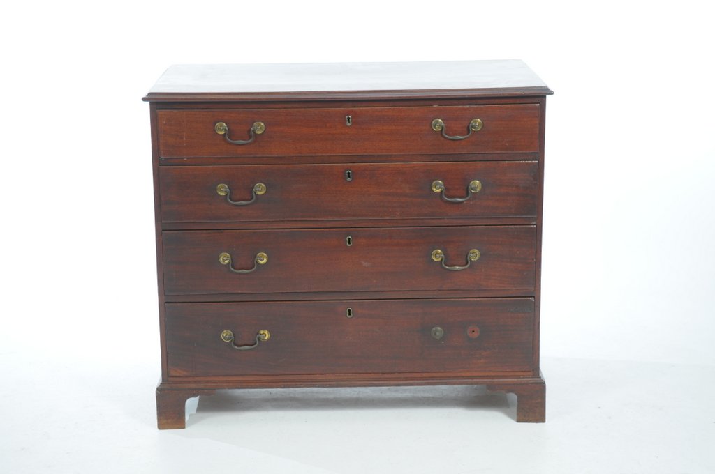 A Georgian mahogany chest of drawers The rectangular moulded top above four graduated cockbeaded