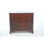 A Georgian mahogany chest of drawers The rectangular moulded top above four graduated cockbeaded