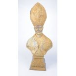 A hammered and cast metal bust of the pope,