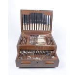 A Mappin & Webb electroplated canteen of cutlery The oak case with hinged cover revealing six