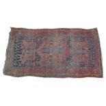 A Qashqai style rug On a predominantly ruby red ground,