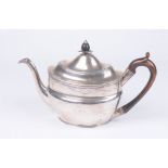 A George III silver tea pot Of plain oval form, with applied reeded borders and rims,