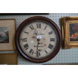 A Victorian mahogany cased circular wall clock, inscribed 'W.