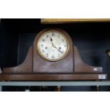 A large early 20th Century oak cased 'Admirals Hat' mantel clock,